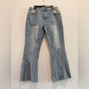 Gallery Dept. flared light wash denim jeans distressed